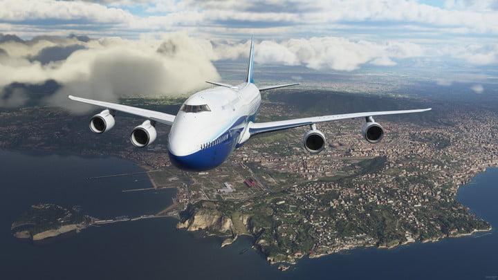 An airplane flies over a city in Microsoft Flight Simulator.